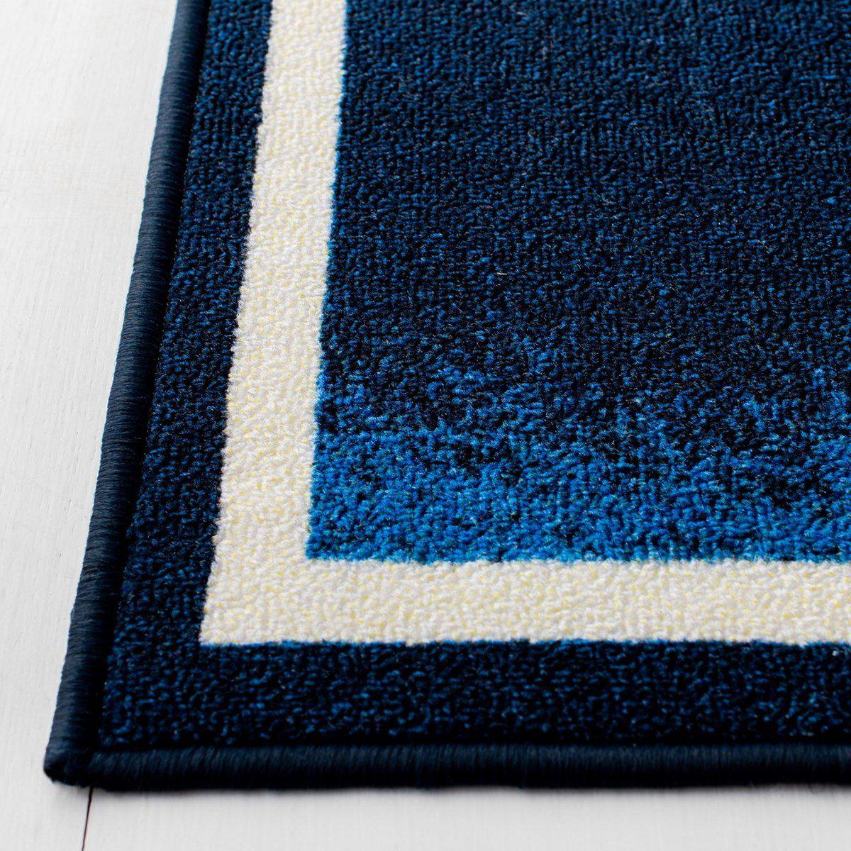 Safavieh Collection Inspired by Disney’s Live Action Film Aladdin - Genie Of The Lamp Rug, Blue / Ivory-Area Rug-Safavieh-The Rug Truck